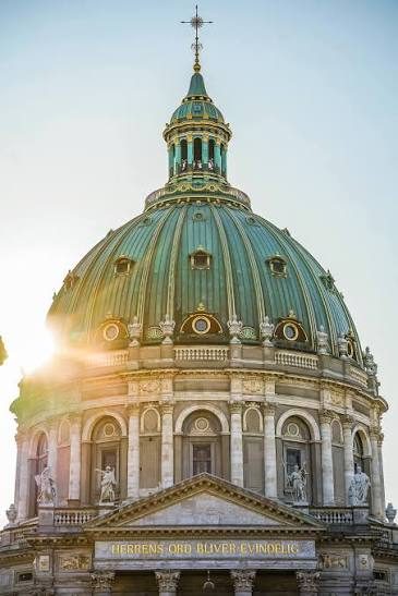 Marmorkirken (Frederik's Church) in Copenhagen with its green copper dome at golden hour